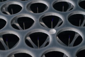 Under normal conditions, it is hard to see any indication of plasma generation. Sometimes it will be a subtle glow on the tips of the filter prongs. This long exposure, low light, macro photography, captures the confined plasma air disinfection at work.